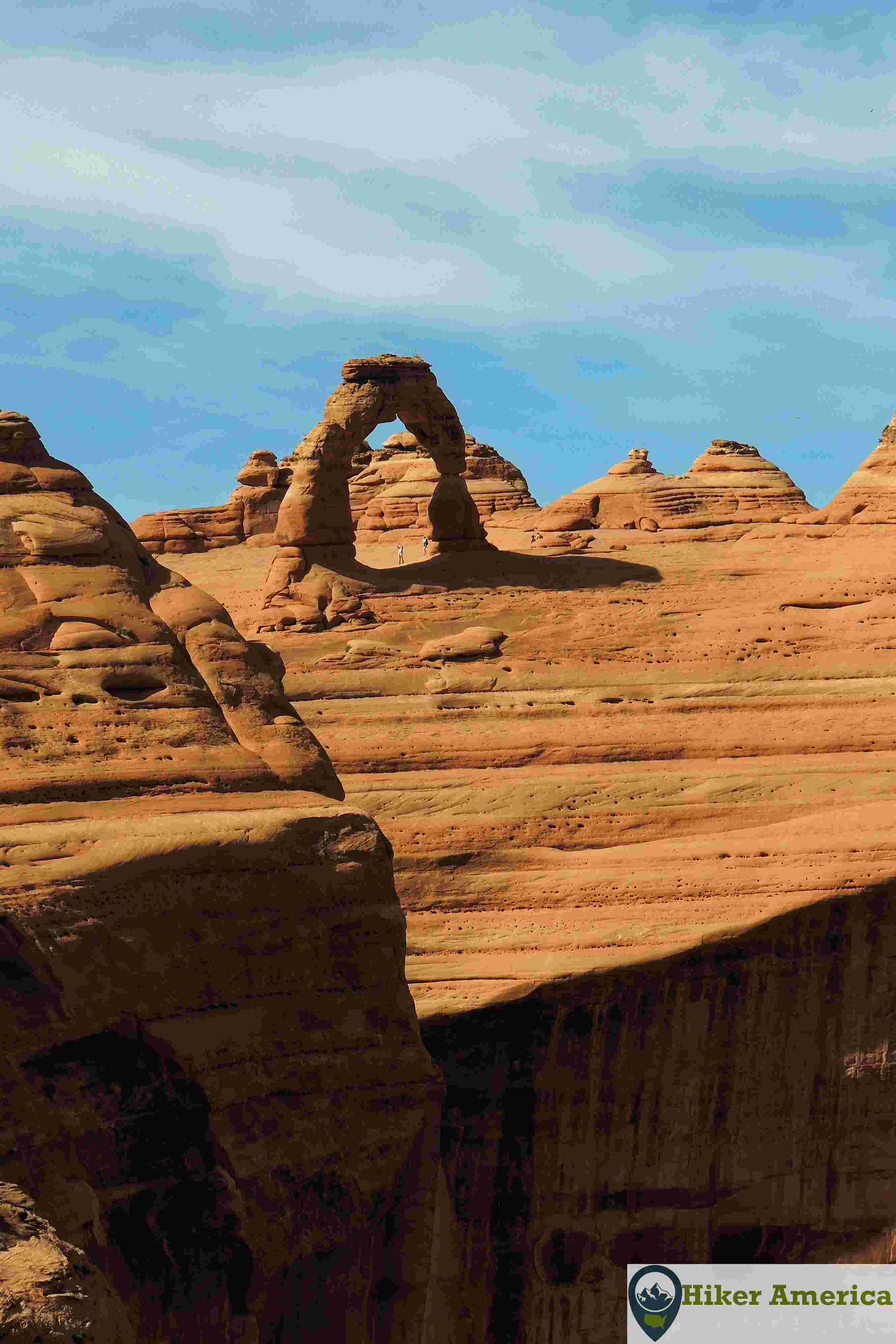 Another vertical shot of Delicate Arch and cliff.